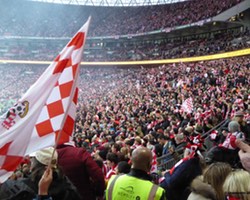 <h4>Saints Flags</h4>The moment you discover the bloke in front is an enthusiastic flag waver