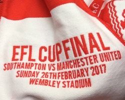 <h4>Commerative Scarf</h4>When we got to our seats we found we had all been given a free scarf by the club